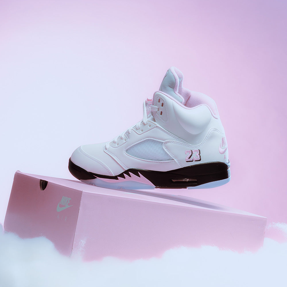 white and pink air jordans