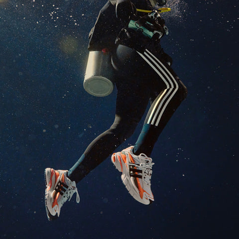 PHARRELL WILLIAMS X ADIDAS ADISTAR JELLYFISH - CORE BLACK/ORANGE