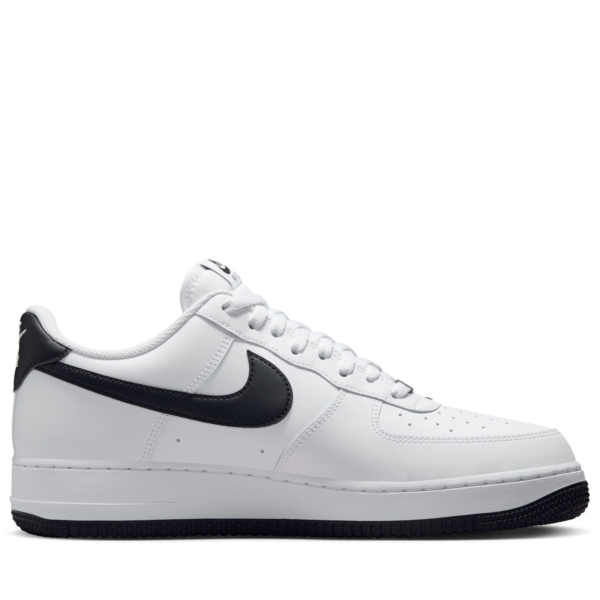 white forces with black nike sign