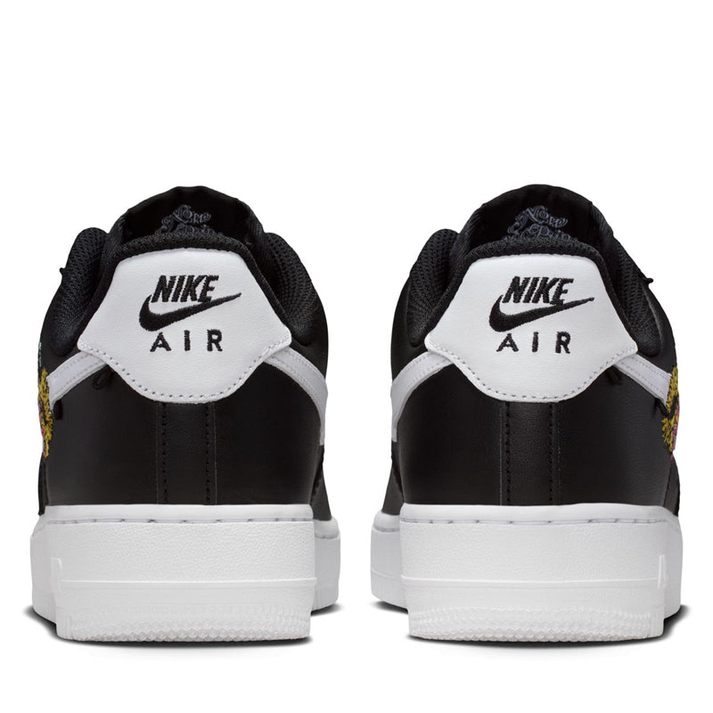 black nikes with flowers