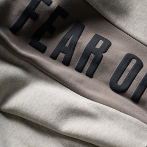 Fear Of God Essentials Paneled Raw Cut Off Sweatpants - Vanilla Heather/Seal