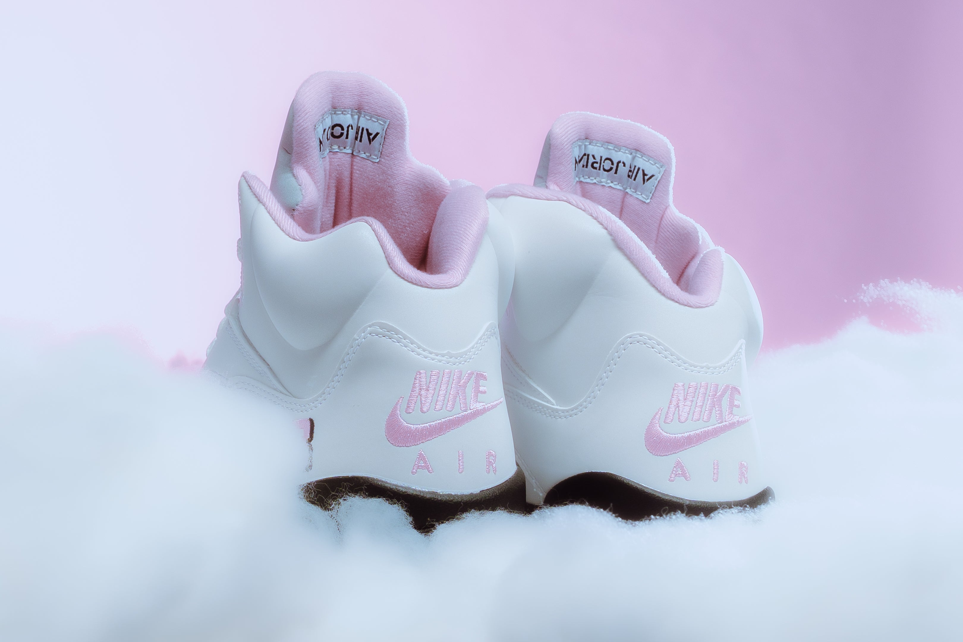 pink and white jordans size 5