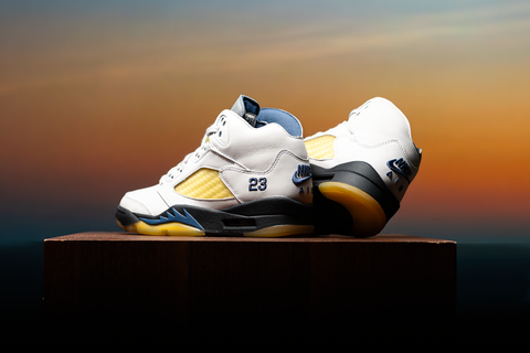 Jordan retro 5 black and gold hotsell