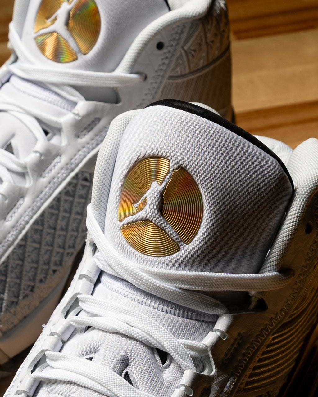 white and gold jumpman jordans