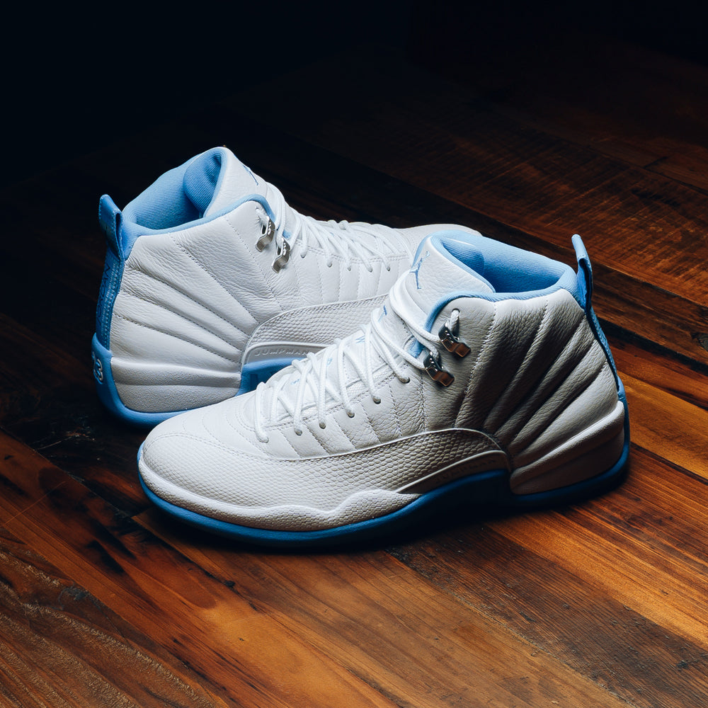 teal and white jordans 12