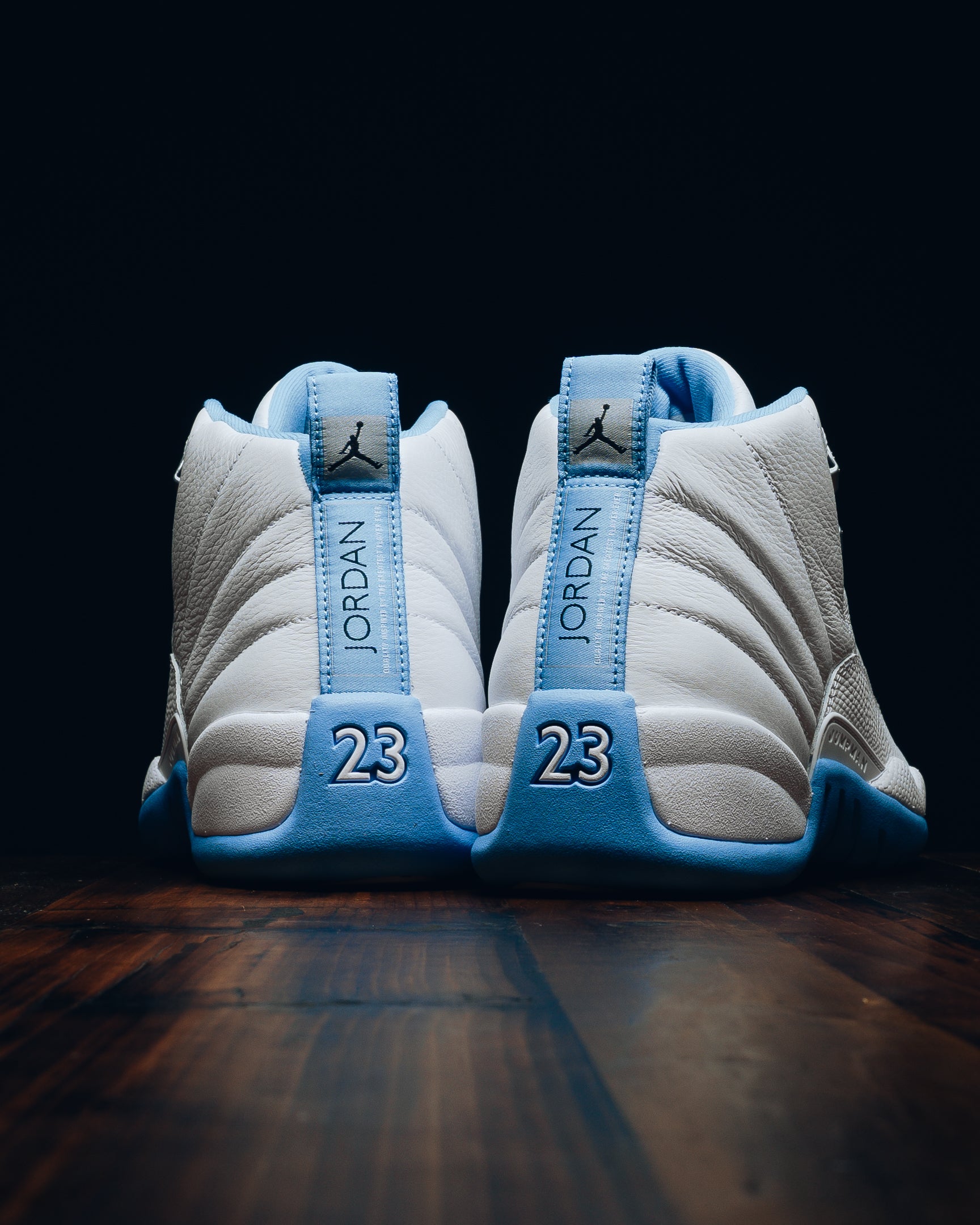 teal and white jordan 12