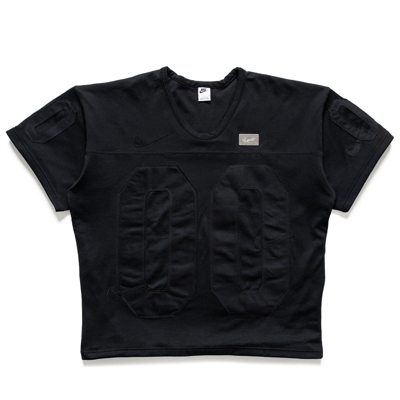 black and silver nike shirt