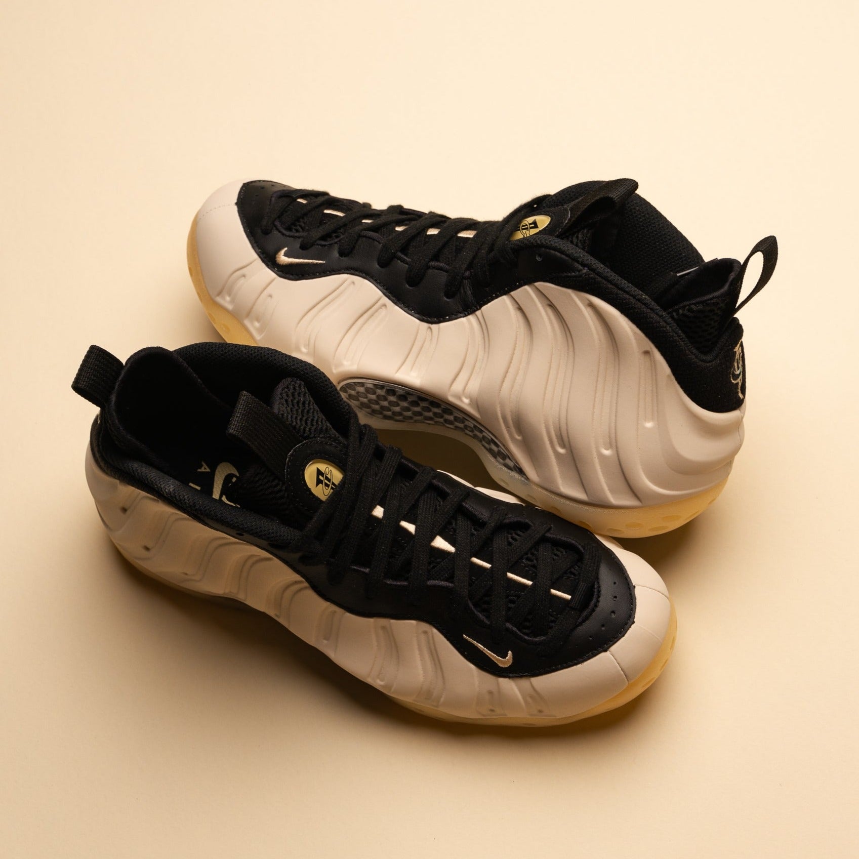 All black and gold foams hotsell