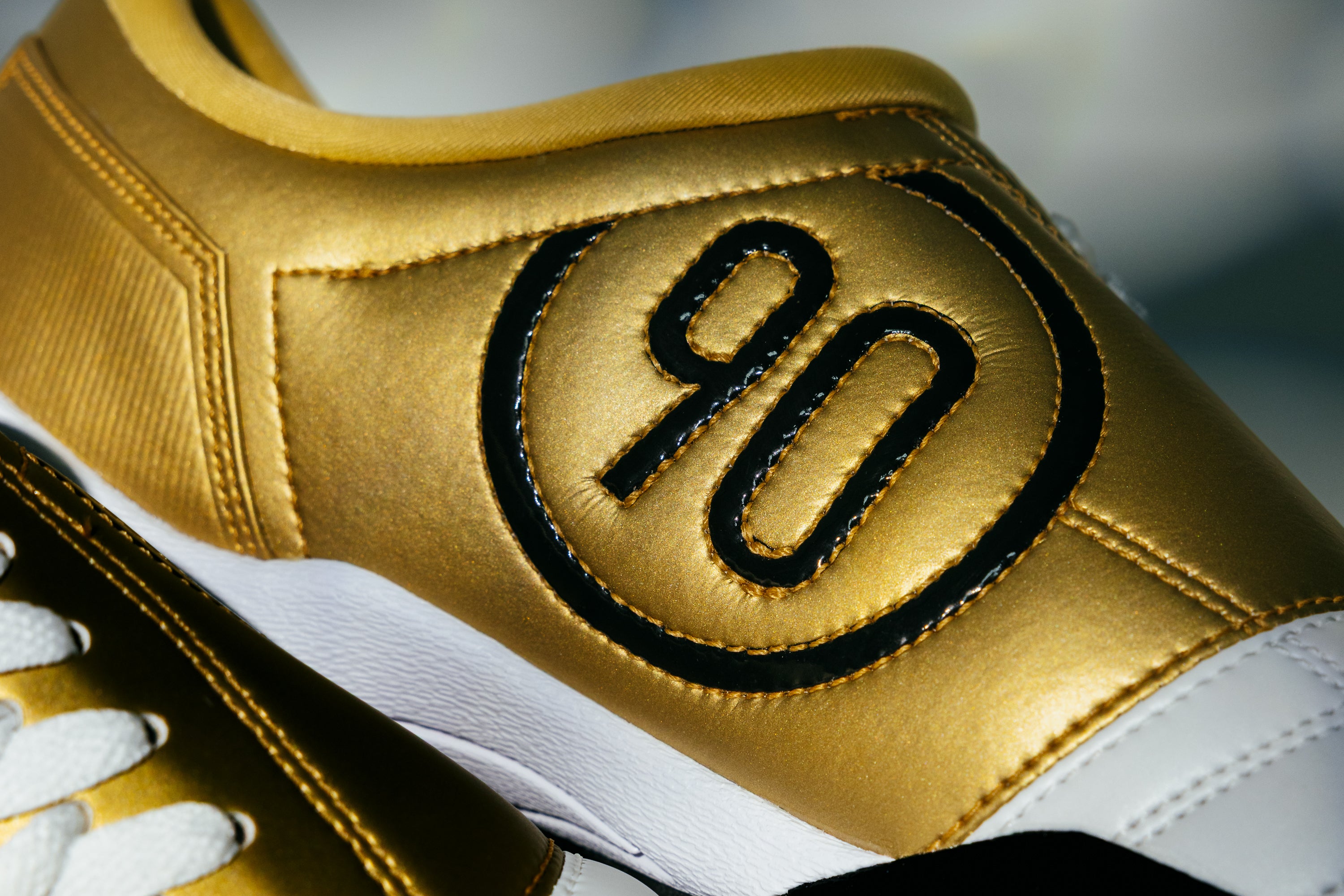 nike t90 gold and black